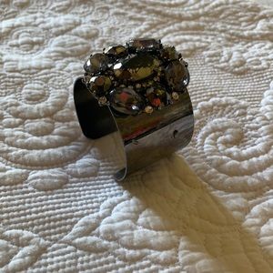 Cuff bracelet with dark gray stones